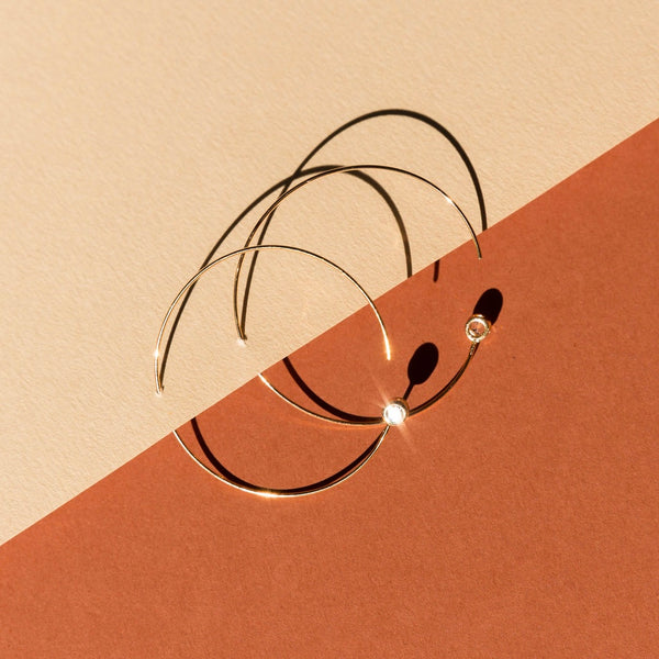 Elegant 2-inch Minimalist Hoops with Swarovski Crystal in Gold Overlay