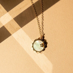 Elegant Scalloped Coin Necklace with Mother of Pearl and Crystal Accent