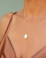 Sophisticated Necklace Featuring Mother of Pearl and Crystal in Bronze Pendant