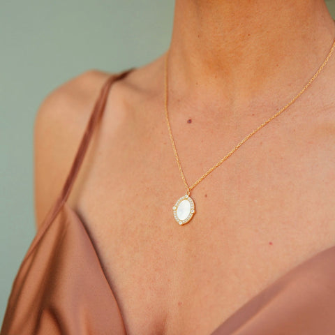 Sophisticated Necklace Featuring Mother of Pearl and Crystal in Bronze Pendant