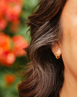 Precision-Crafted Huggie Earrings with Heart Charms