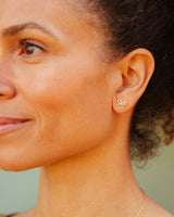Sophisticated and Playful Bow Stud Earrings in Bronze with Gold Overlay
