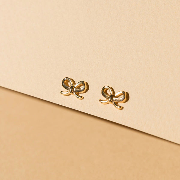 Delicate Tiny Bow Stud Earrings with Elegant Gold Overlay