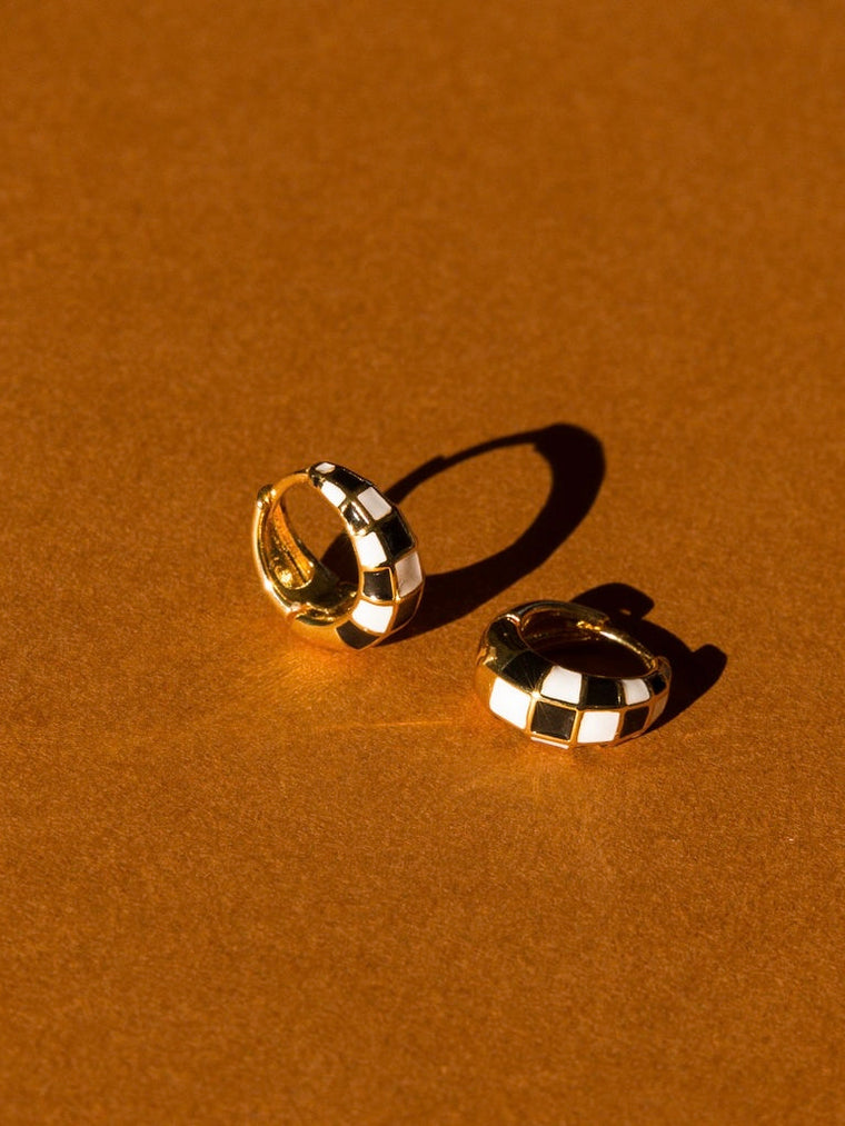 Stylish Black and White Checker Huggie Earrings with Gold Overlay