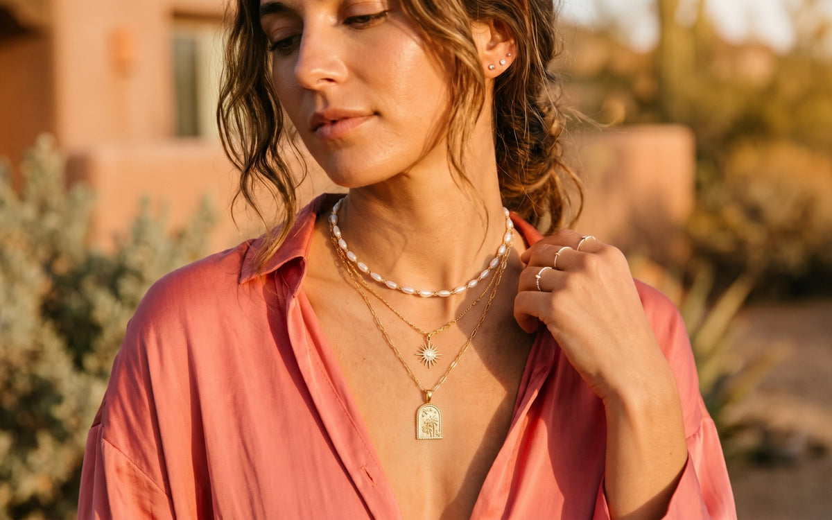 Handcrafted gold jewelry on model